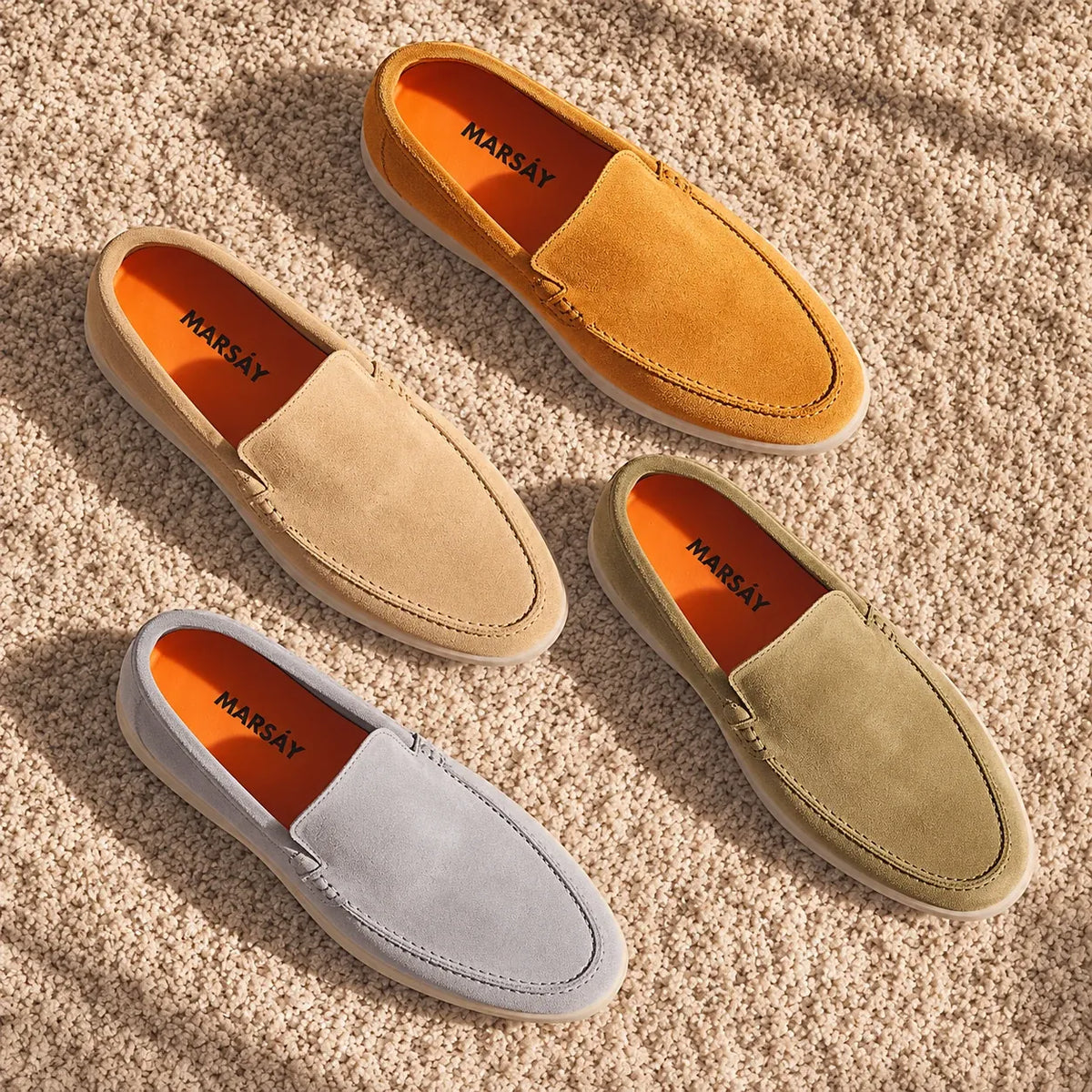 Loafers MARSAY din piele întoarsă, în nuanțe de nisip, ocru, olive și gri.